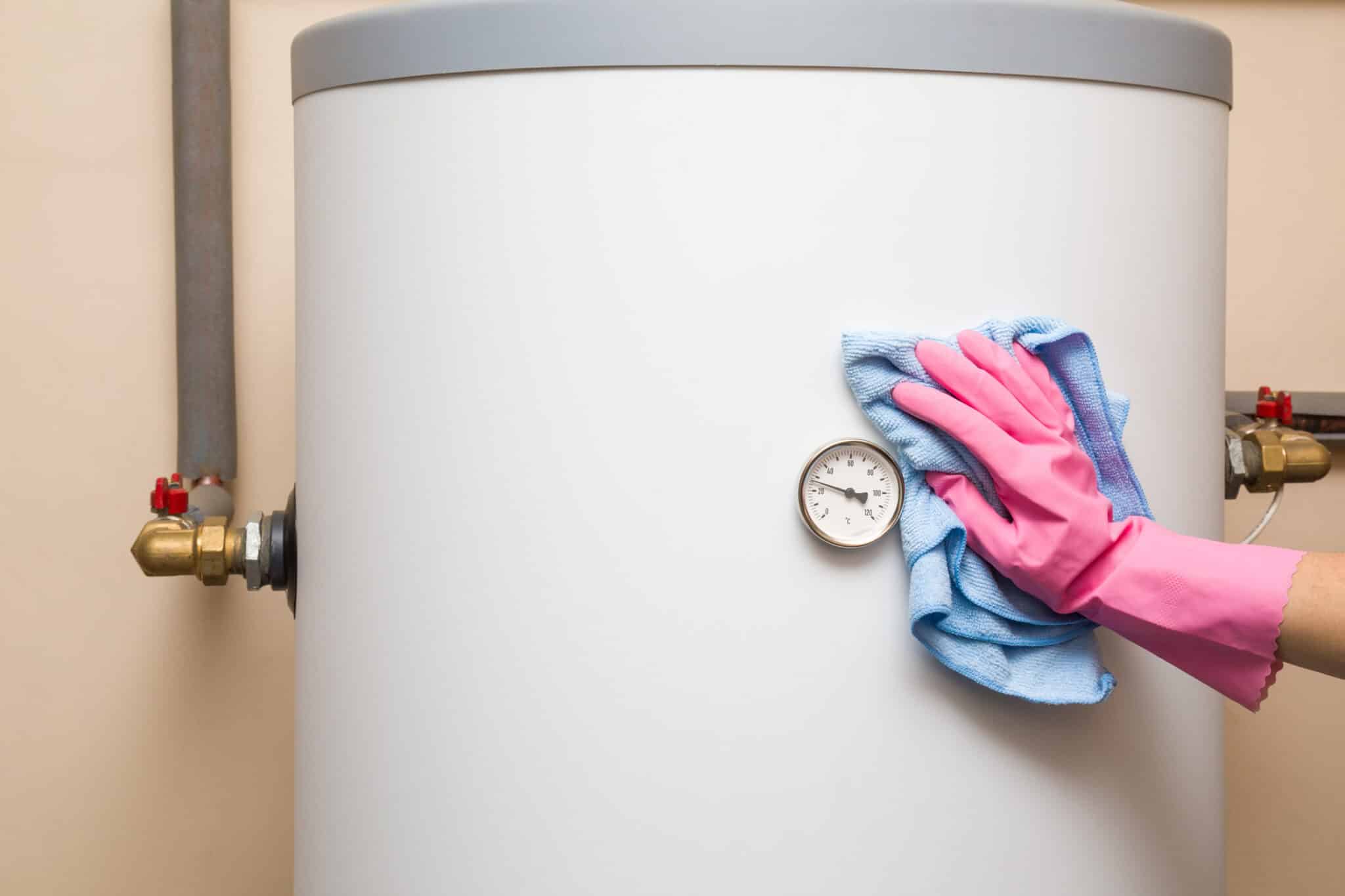 Cleaning around water heater, Plumbing Inspection.