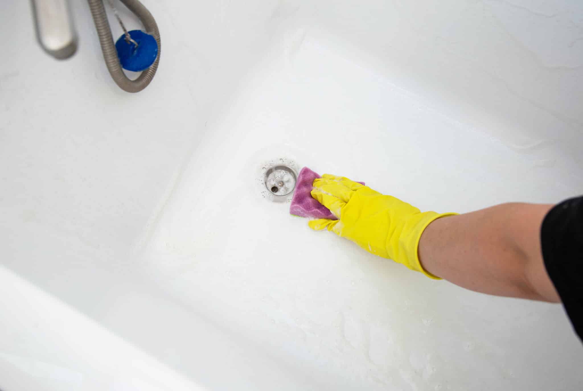 Tub Drain Stopper Fixes That Actually Work 1 Cleaning tub drain stopper.