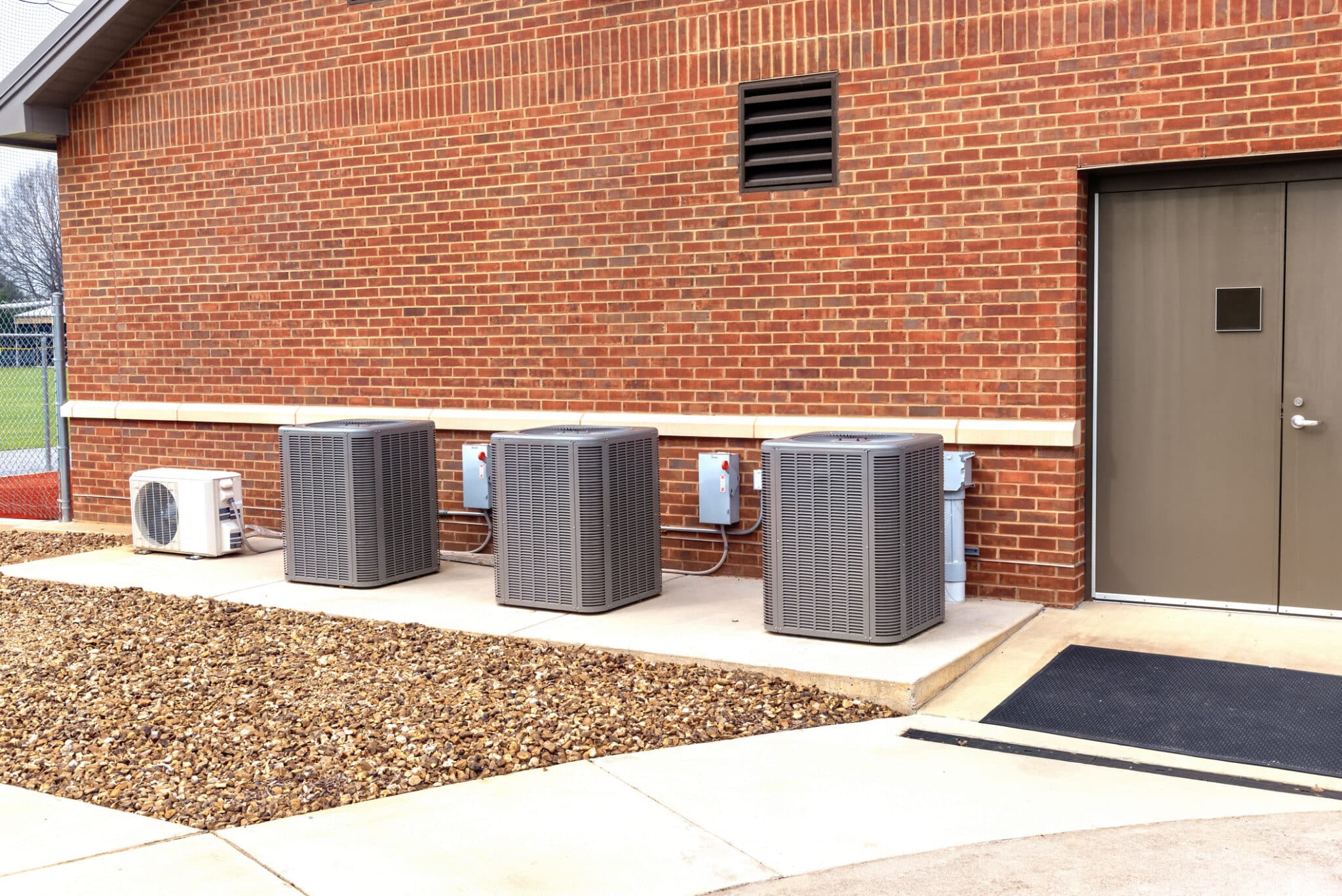AC Replacement in Knoxville - Knowing the Right Time 1 Horizontal shot of HVAC units outside, AC replacement in Knoxville.