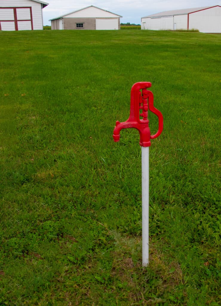 Yard hydrant install for year round outdoor water access.